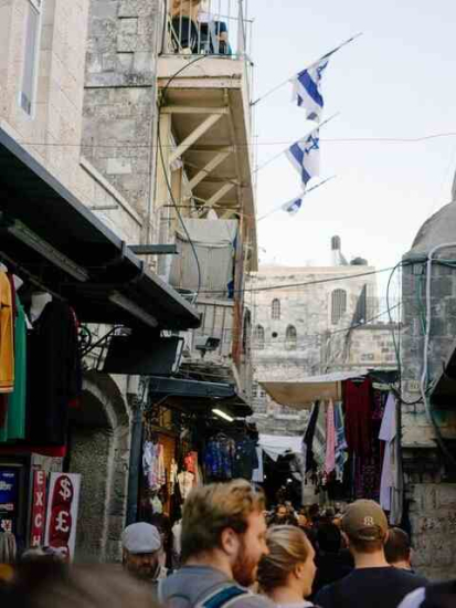 Old City with Israeli Flag and Kaffiyahs Photo by Haley Black from Pexels 480x640